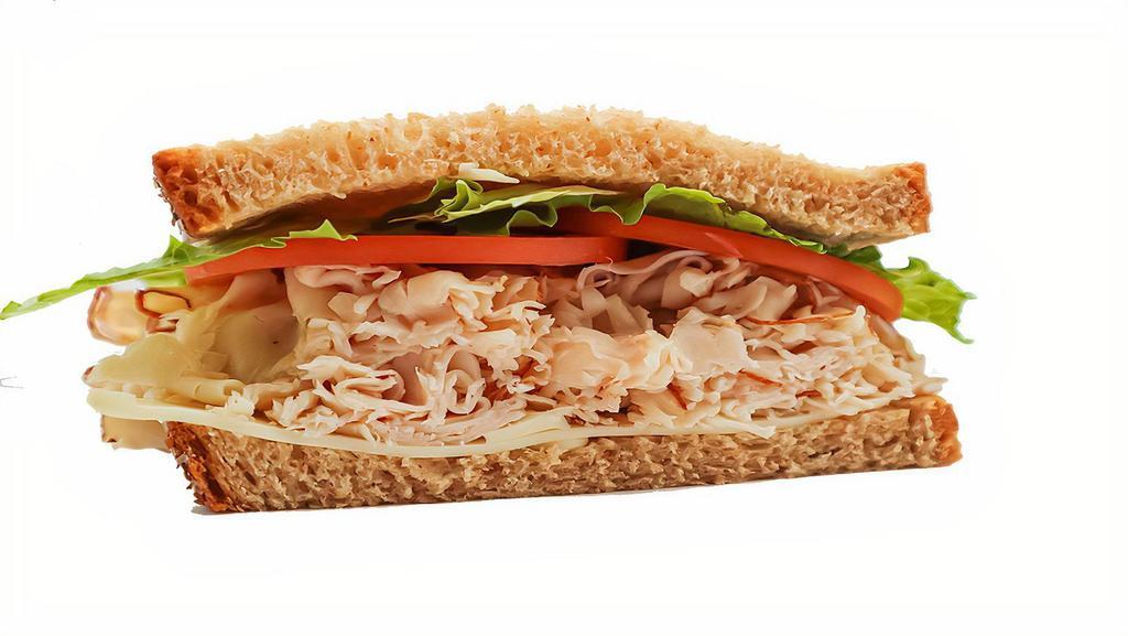Half Turkey Giant Deli Sandwich · A fan favorite, featuring freshly sliced premium turkey breast piled high on your choice of New York Bakery bread. Add your favorite toppings and enjoy!