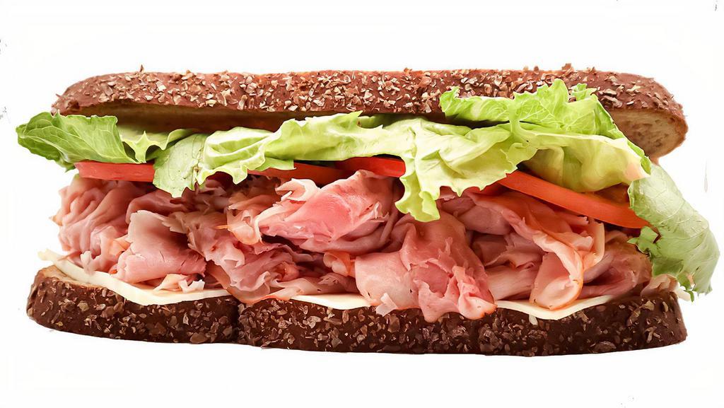 Whole Ham Giant Deli Sandwich · Looking for a classic? You wont go wrong with our Ham Giant Deli sandwich. Freshly sliced ham, New York Bakery bread, your choice of toppings, and your favorite sauce!