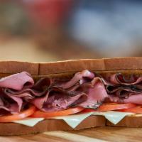 Whole Keegan Giant Deli Sandwich · Can't decide? Try our delightful freshly-sliced roast beef on New York Bakery white bread to...