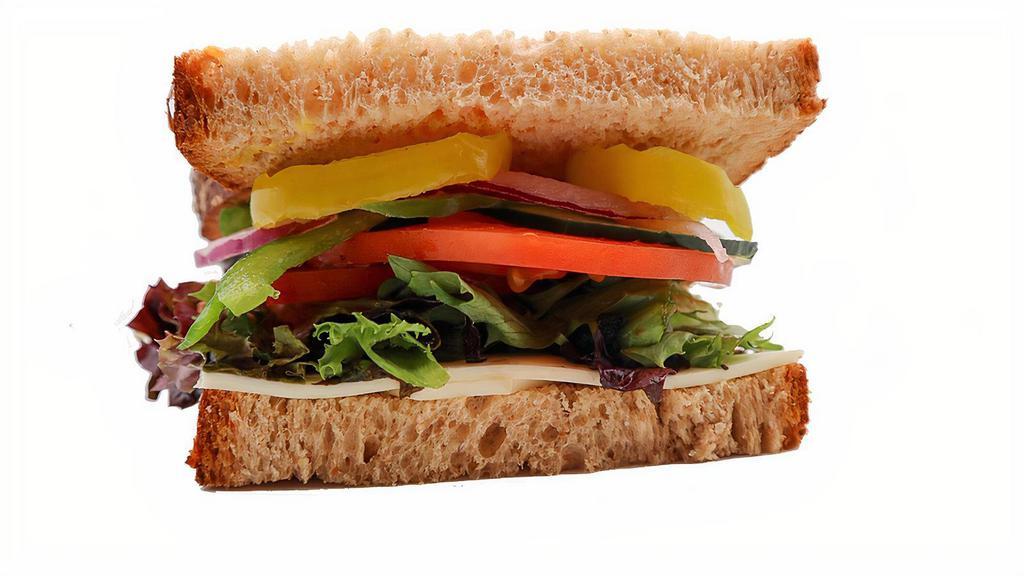 Half Veggie Giant Deli Sandwich · Pile the veggies on any way you want on the Veggie Giant Deli sandwich! Your choice of New York Bakery bread, and any cheese or sauce you want!
