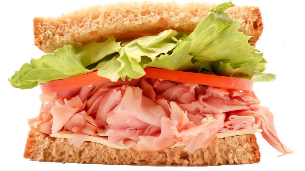 Half Ham Giant Deli Sandwich · Looking for a classic? You wont go wrong with our Ham Giant Deli sandwich. Freshly sliced ham, New York Bakery bread, your choice of toppings, and your favorite sauce!
