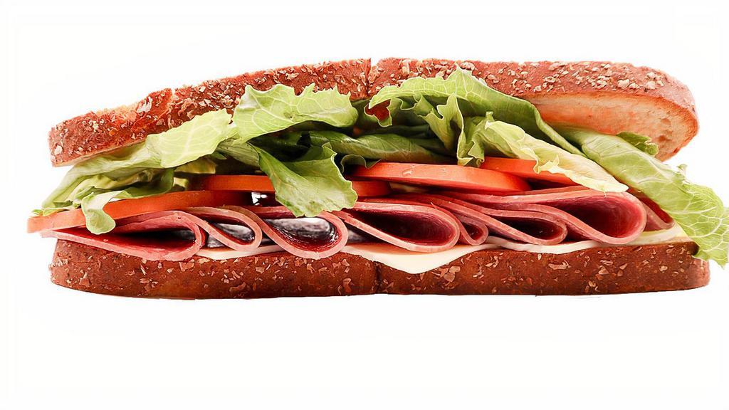 Whole Salami Giant Deli Sandwich · Our beyond enjoyable Giant Deli Salami sandwich which features freshly sliced premium salami piled high on your choice of New York Bakery bread. Add your favorite toppings and enjoy!