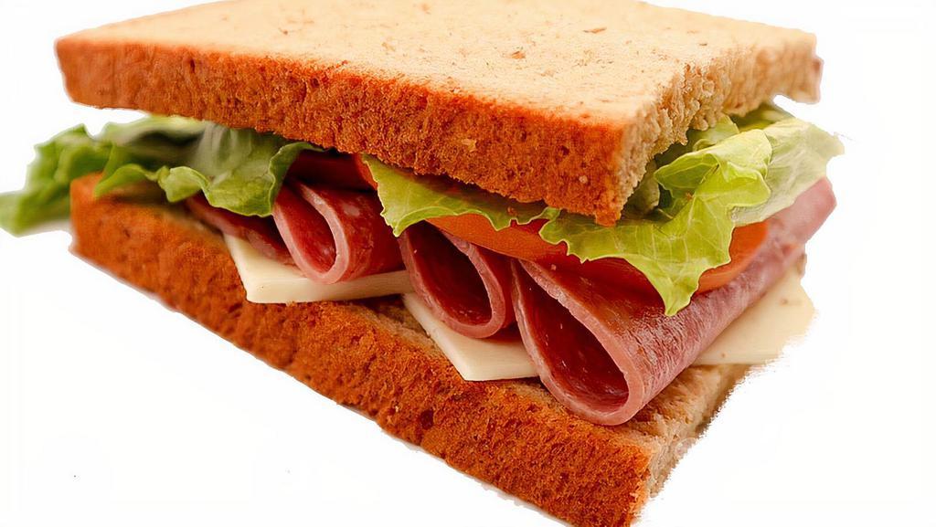 Half Salami Giant Deli Sandwich · Our beyond enjoyable Giant Deli Salami sandwich which features freshly sliced premium salami piled high on your choice of New York Bakery bread. Add your favorite toppings and enjoy!