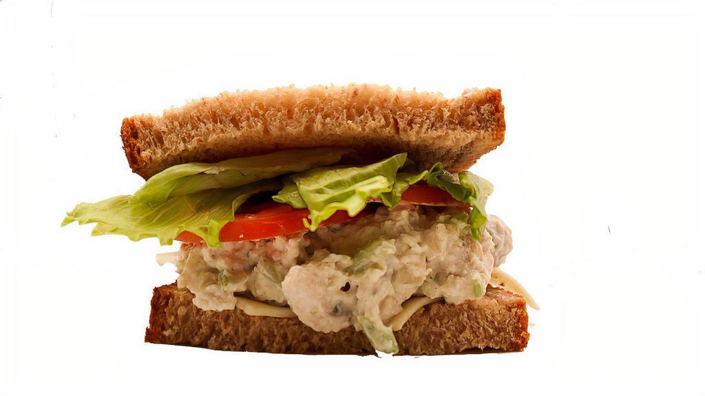 Half Chicken Salad Sandwich · You can't go wrong with our delicious Chicken Salad Giant Deli sandwich. This sandwich features freshly made premium chicken salad piled high on your choice of New York Bakery bread. Add your favorite toppings and enjoy!