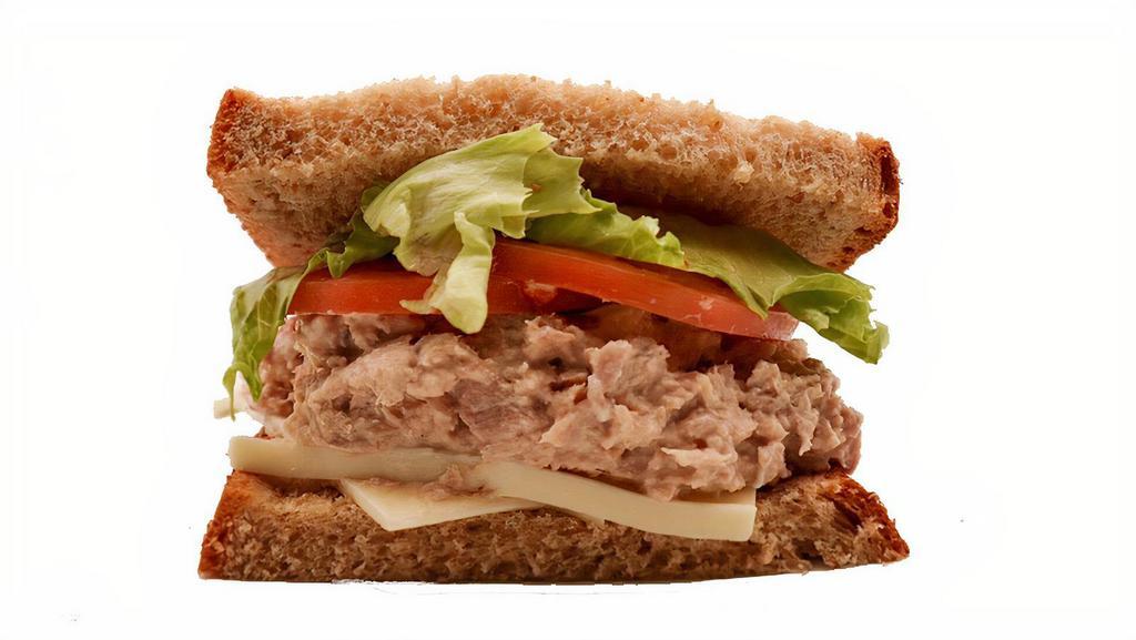 Half Tuna Salad Sandwich · Love tuna salad? You can't go wrong with this sandwich! Freshly made tuna salad on your choice of New York Bakery bread. Add your favorite toppings and enjoy every bite.