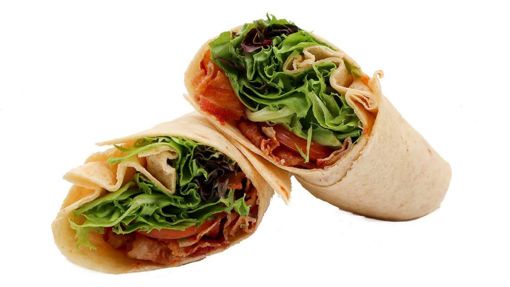 Blt Wrap · You can't go wrong with a BLT. Select your wrap, filled with delicious bacon, lettuce and tomato, add your toppings and sauces and you're all set!