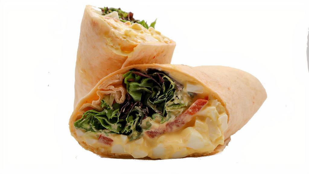 Egg Salad Wrap · Our Egg Salad wrap is packed full with flavorful egg salad. Select your wrap, add your choice of vegetables and sauce and enjoy!
