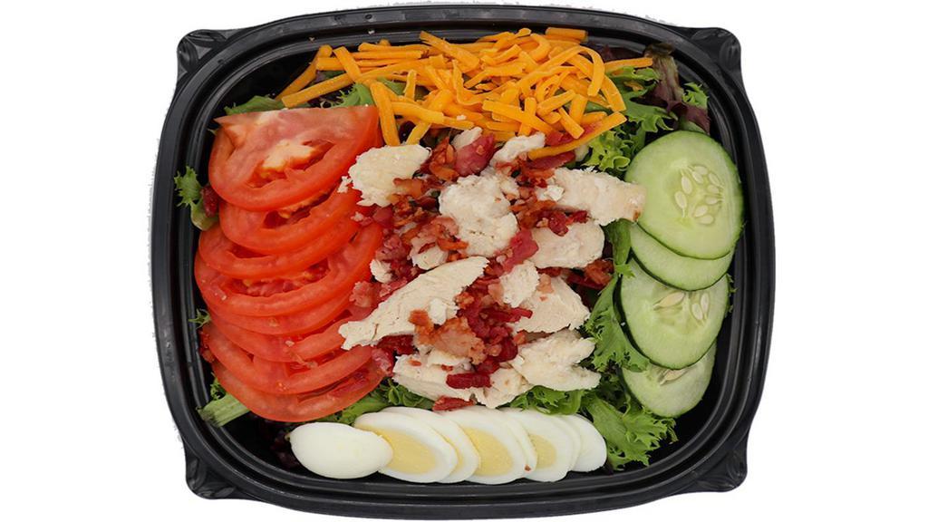 Chicken Cobb · Arcadian Lettuce, Cucumber, Green Pepper, Tomatoes, Chicken Strips, Bacon Crumbles, Shredded Cheddar Cheese, and a Hardboiled Egg. Your choice of dressing.