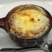 Soupe A L'Oignon · Onion soup, crouton, gruyere cheese.