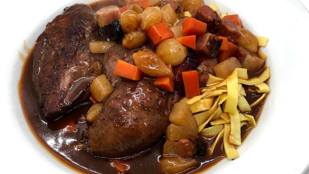 Coq Au Vin · Chicken simmered in red wine, smoked bacon, root vegetables, tagliatelle pasta