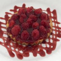 Tarte Framboise · Fresh raspberries over vanilla custard in sweet baked pastry