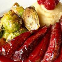 Saturday - Magret De Canard Au Framboise · Sliced duck breast, mashed potatoes, Brussel sprouts, fresh raspberry, raspberry glaze (AVAI...