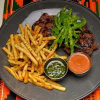 Steak Frites · Rooster chimichurri, BBQ bearnaise, green bean salad, and fries.
Specify temperature on stea...
