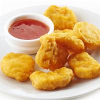 Chicken Nuggets · Breaded nuggets of chicken fried to golden perfection.