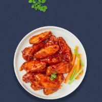 Buffalo Horizon Vegan Wings · Fresh vegan wings breaded, fried until golden brown, and tossed in buffalo sauce. Served wit...