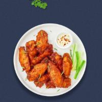 Classic Vegan Wings · Fresh vegan wings breaded and fried until golden brown. Served with a side of vegan ranch or...