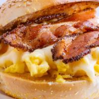 Turkey Bacon, Egg & Cheese Sandwich · Fresh farm eggs topped with melted cheese and turkey bacon, and served on your choice of bre...