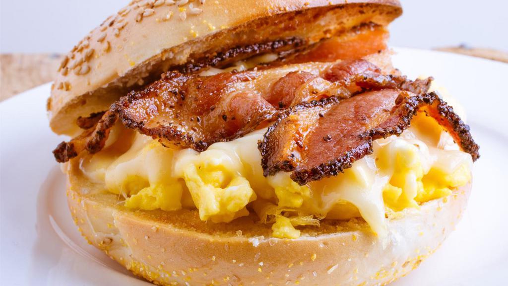 Turkey Bacon, Egg & Cheese Sandwich · Fresh farm eggs topped with melted cheese and turkey bacon, and served on your choice of bread.