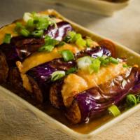 Stuffed Eggplant · 3 pieces of eggplants stuffed with deep fried shrimp paste and served with brown sauce and s...