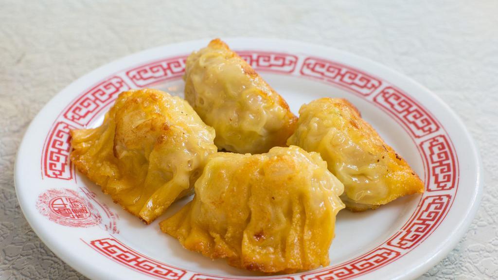 Pan-Fried Chicken & Cabbage Dumplings · 4 chicken and napa cabbage dumplings