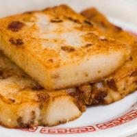 Turnip Cakes · Grated turnip, dried shrimp and Chinese sausage; served with Hoisin sauce.