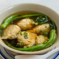 Chicken & Cabbage Dumplings In Soup · Chicken and Napa cabbage dumplings in chicken broth with vegetables.
