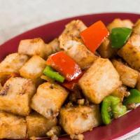 Turnip Cake With Xo Sauce · Turnip cake stir-fried with chili peppers and XO sauce (contains pork, scallops, and shrimp)