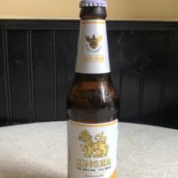 Singha (Thailand) · 100% barley malt beer. Golden amber. Nice tangy bite,
great bitter aftertaste.