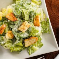 Caesar Salad With Grilled Chicken · Fresh salad made with Grilled Chicken, romaine lettuce, sliced Romano cheese, and homemade g...