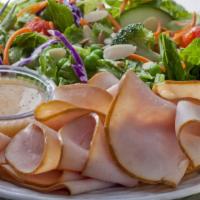 Chef'S Salad · Fresh salad made with Sliced roast Turkey, boiled Ham, Roast beef, Swiss & American cheese, ...