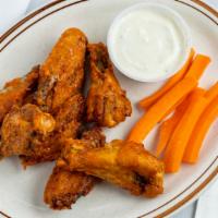 Buffalo Wings · 8 Jumbo wings! Choose your sauce: Buffalo, Mango habanero or Garlic Parmesan