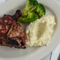 16Oz Veal Chop · Served with tossed salad, vegetable and choice of Baked Potato, Mashed Potatoes, French Frie...