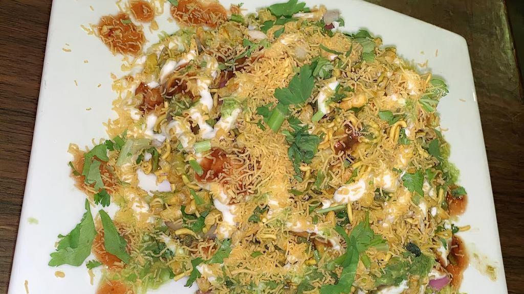 Bhel Poori(Gluten Free) · Puffed rice, onion, and tomato tossed with fresh herbs. Served with tamarind and cilantro chutneys.