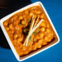 Channa Masala(Vegan) · Cooked in onion and tomato sauce.