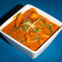 Mixed Vegetable Tikka Masala · Mixed vegetables cooked in a mild, creamy tomato sauce.