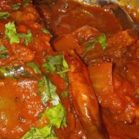 Lamb Curry · Slowly cooked in a curry.