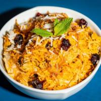 Chicken Biryani · Basmati rice cooked with boneless chicken, herbs and spices.