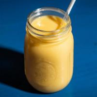Mango Lassi · Chilled yogurt drink with mango.