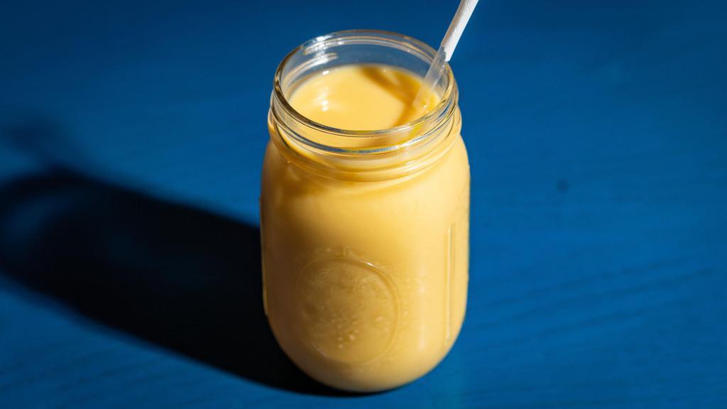 Mango Lassi · Chilled yogurt drink with mango.
