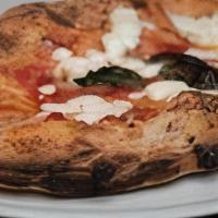 Night And Day Calzone · INSIDE: fresh mozzarella, fresh ricotta, cooked Italian ham . ON TOP: tomato sauce, fresh mo...