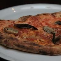 Calzone With Mushrooms · Filled with fresh mozzarella, fresh ricotta, assorted mushrooms. On top tomato sauce, basil ...