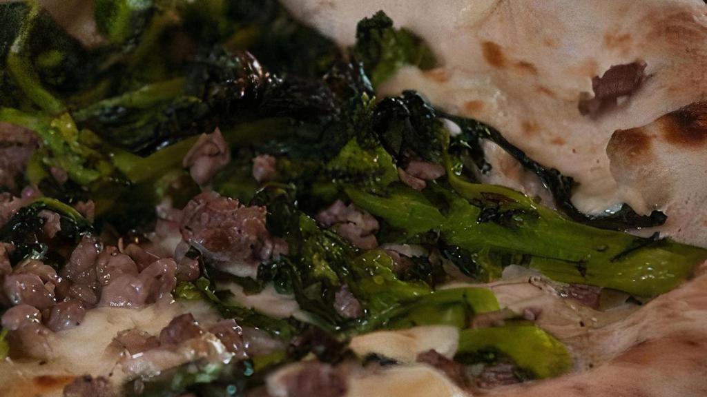 Salsiccia E Friarielli · imported smoked buffalo mozzarella, broccoli rabe, sausage, extra virgin olive oil