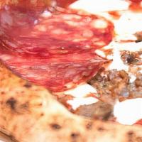 Macellaio · (The Butcher) - tomato sauce, fresh mozzarella, sausage, cooked Italian ham, salame toscano,...