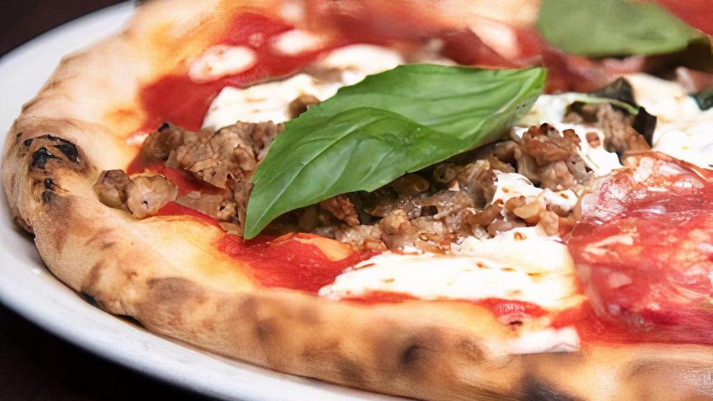 Gf Macellaio · Gluten-Free The Butcher – tomato sauce, fresh mozzarella, sausage, porchetta, salami crespona, prosciutto di parma, parmigiano reggiano