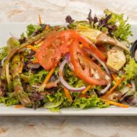 Market Salad · Mix of mesclun greens with sliced tomato, shredded carrot, and red onion.

Choice of dressin...