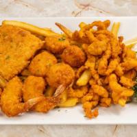 Fisherman’S Combo · Breaded cod, shrimp, scallops, and clam strips. Comes with fries and tartar sauce.