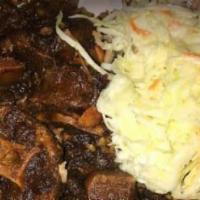 Oxtail Dinner · Rice and peas or white rice.