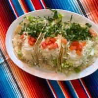 Tacos Con Todo (3) · Soft corn tortillas topped with cilantro, onions, lettuce tomato, sour cream cheese.