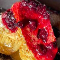 Blueberry Lemon Curd French Toast · BRIOCHE + LEMON CURD + BLUEBERRY THYME COMPOTE + TOASTED ALMONDS + POWDERED SUGAR (4 PIECES)