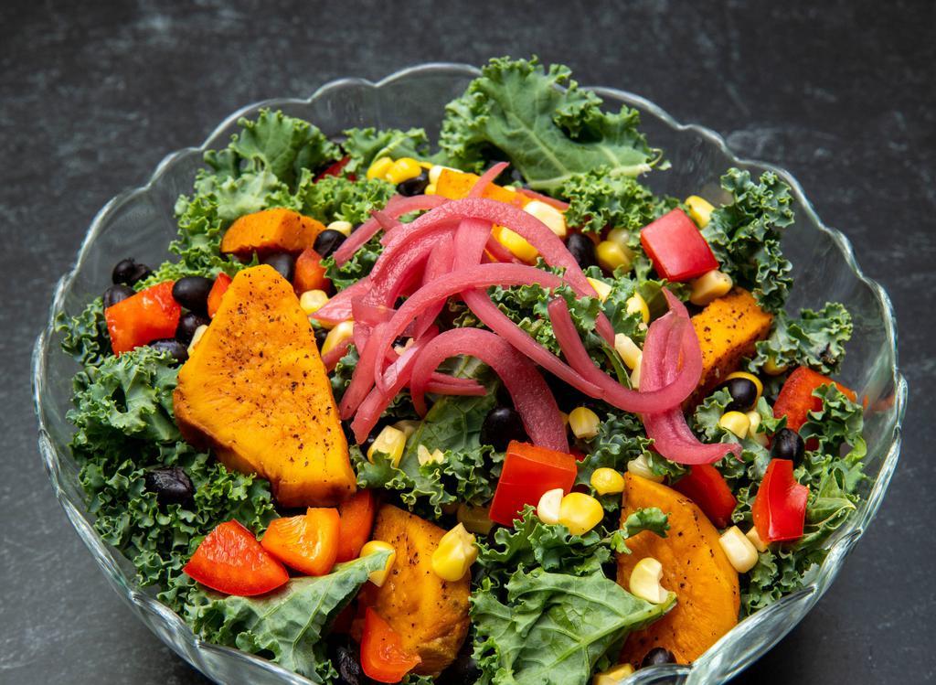 Mexi Kale Salad · Roasted sweet potato, black beans, pickled onions, red peppers, cilantro citrus dressing.